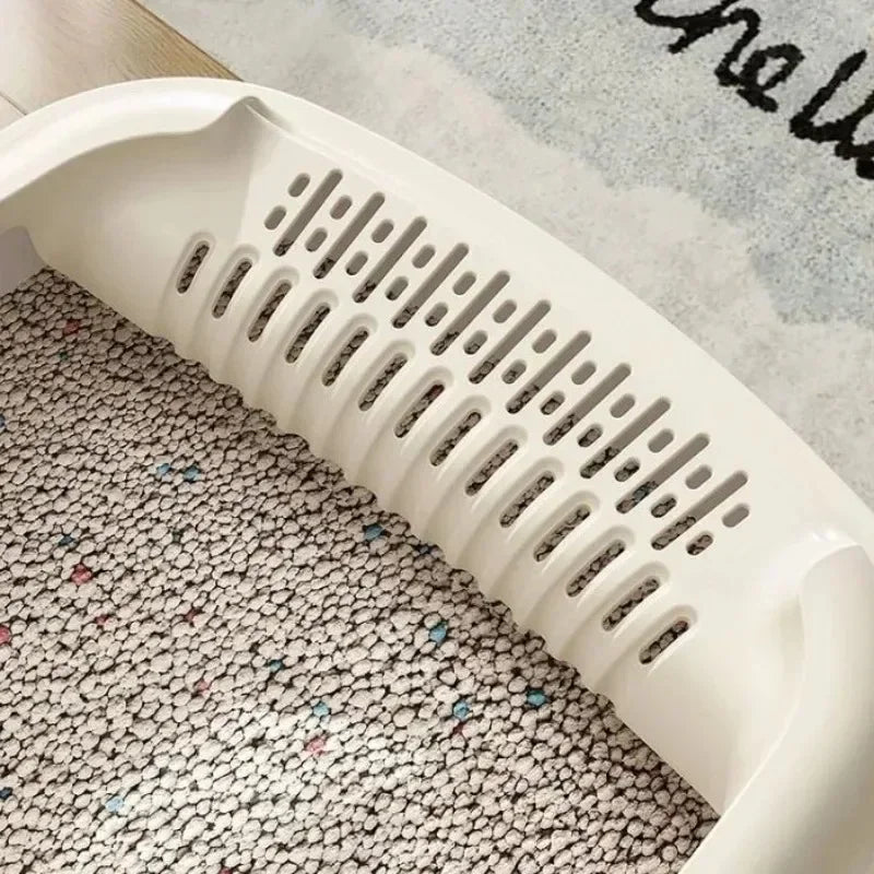 Kattebakke med stænkbeskyttelse og rist