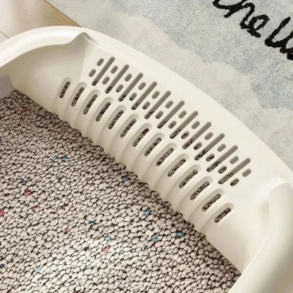 Kattebakke med stænkbeskyttelse og rist